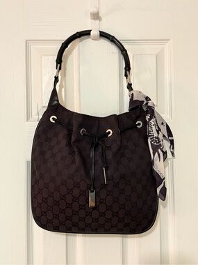 Authentic Gucci by Tom Ford GUCCI GG CANVAS BAMBOO HANDLE BUCKET BAG BLACK GUC